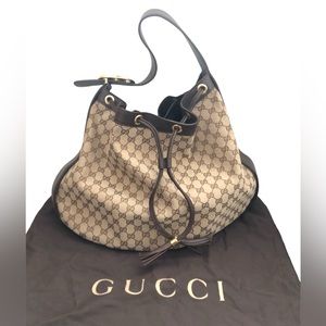 Authentic Gucci GG drawstring hobo bag
